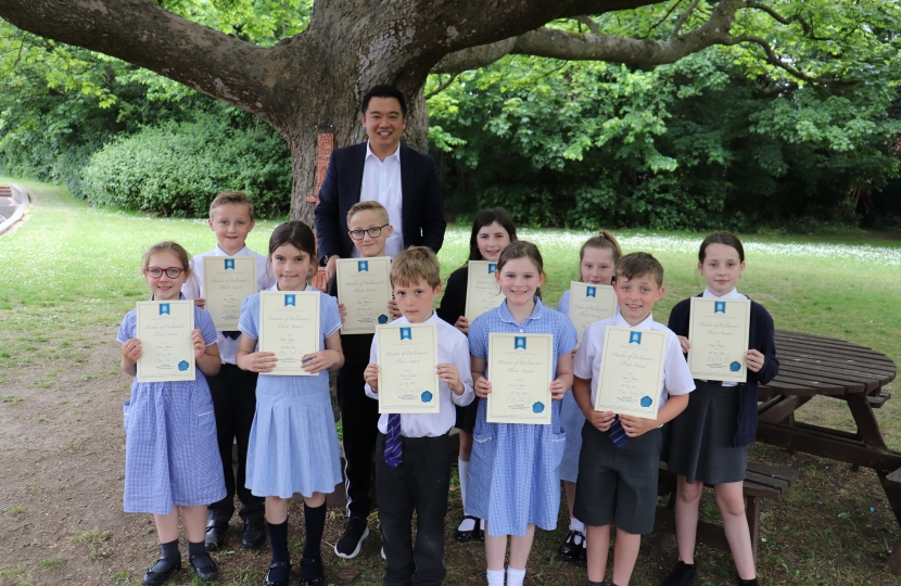Alan Mak with local school pupils
