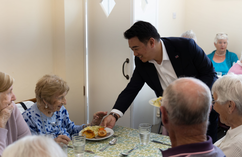 Local MP Alan Mak serves roasts to elderly residents at Age Concern Hayling Island's Lunch Club