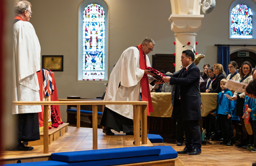 Local MP Alan Mak takes part in 2025 Remembrance Sunday service at St James' Church in Emsworth
