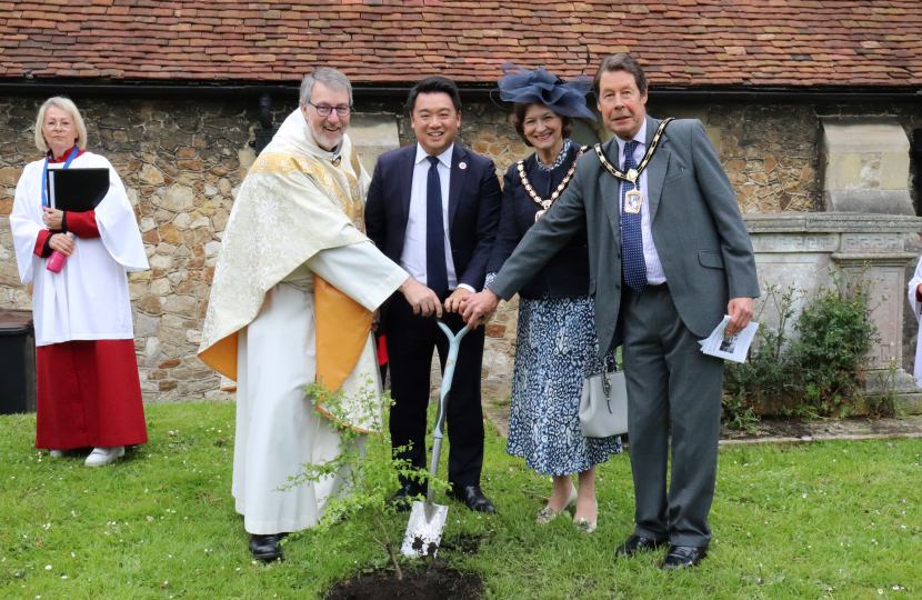 Local MP Alan Mak joins Tom Kennar and Diana Patrick in planting a Hawthorne Tree in the church gardens 