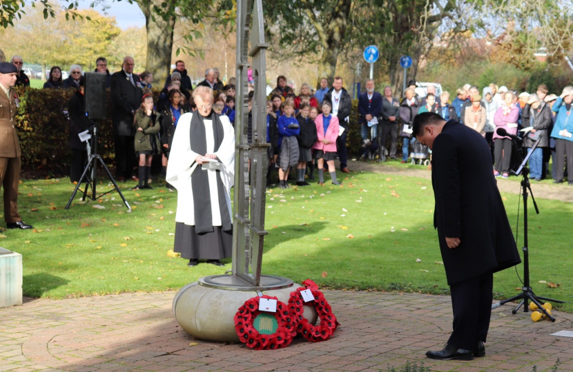 Local MP Alan Mak lays a wreath at Emsworth Memorial Garden.