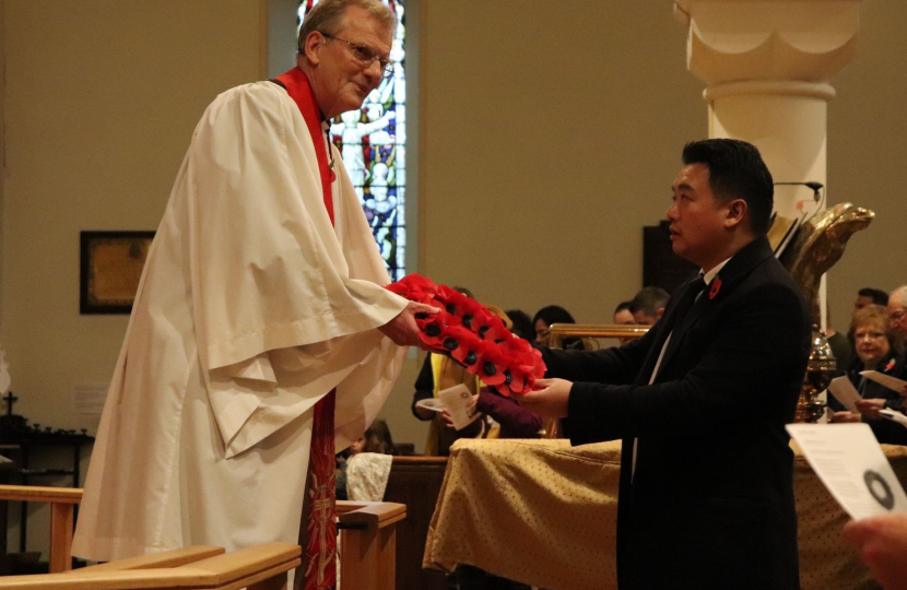 Local MP Alan Mak takes part in Remembrance Sunday service at St James' Church in Emsworth