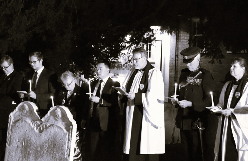 Local MP Alan Mak observed a minute's silence at St Faiths Church with civic leaders and mourners