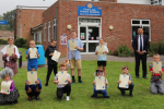 Alan presents his MP School Merit Awards to school children from Front Lawn Primary Academy who were dressed up as part of an event for AgeUK 