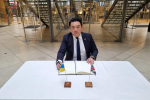  Local MP Alan Mak signs the Book of Solidarity in the House of Commons.