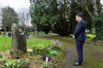 Local MP Alan Mak lights candle in Havant Cemetery to mark Holocaust Memorial Day and 81st anniversary of Auschwitz-Birkenau liberation