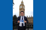 Alan Mak MP with his Cost of Living Guide after successfully campaigning in Westminster for the payments to be delivered. 