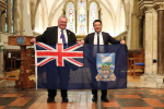 Local MP Alan Mak receives a Falklands Flag from Legislative Assembly Member for Stanley Roger Spink.