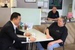 Local MP Alan Mak helps family celebrate first year running popular Up The Creek cafe on Hayling Island