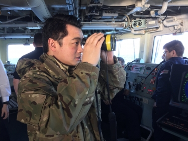 Local MP Alan Mak assists with the watch on the Bridge of HMS Monmouth