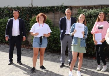 Alan Mak MP with pupils at Park Community School in Leigh Park after collecting their exam results