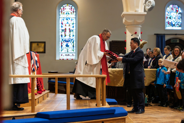 Local MP Alan Mak takes part in 2025 Remembrance Sunday service at St James' Church in Emsworth