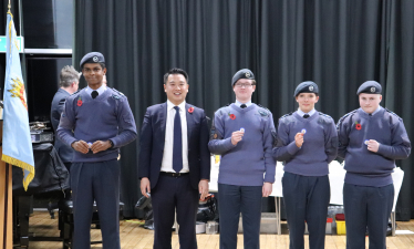 Local MP Alan Mak presents commemorative coins to RAF air cadets at 2327 (Havant) Squadron after they win prestigious national prize