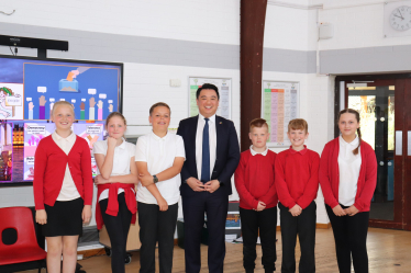 Local MP Alan Mak with pupils at Trosnant Junior School