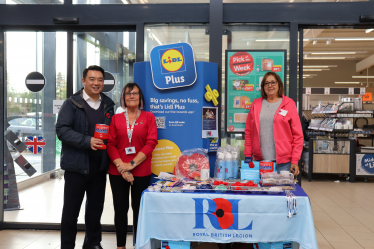 Local MP Alan Mak sold poppies at the Lidl Superstore on Hayling Island. 